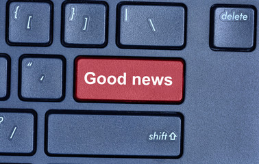 Good news words on computer keyboard