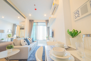 Modern living and dining room with wood floor