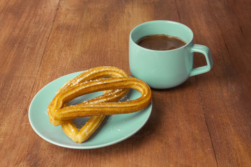 Traditional Spanish churros dessert with copyspace