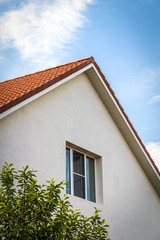 The upper part of the house. Roof, inspection windows, chimney.