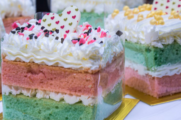 Rainbow cake with heart topping