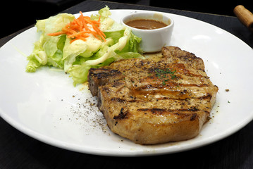 pork chop with salad