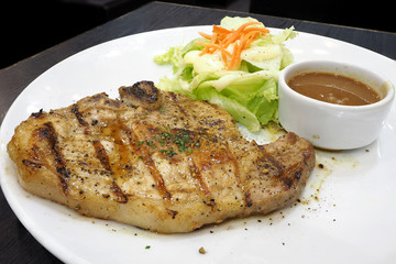 pork chop with salad