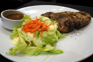 pork chop with salad