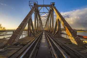 Fototapeta na wymiar old drawbridge railway bridge on the Odra River in Szczecin