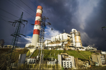 power plant in Szczecin against passing menacing storm cloud