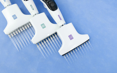 Set of electronic mulichannel pipettes for biological experiments 