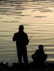 Father and Son Fishing Silhouette