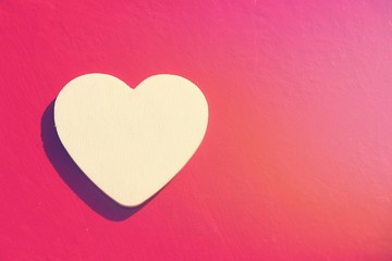 the heart shape wood on the rain drops and the sunlights