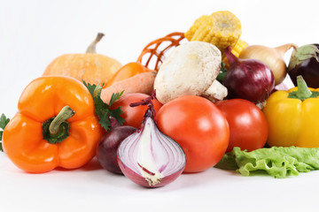 fresh vegetables - tomatoes,peppers onions,mushrooms in a wicker