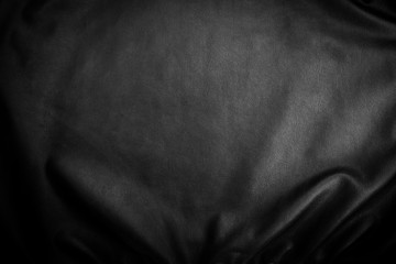 Black leather texture closeup.