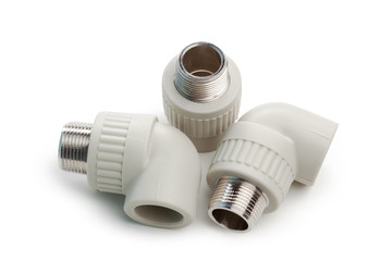 Set of metal-plastic plumbing couplings, adapters, plugs isolated on white background