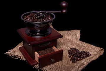A photo of a vintage coffee grinder