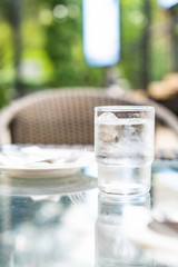 a glass of water on table