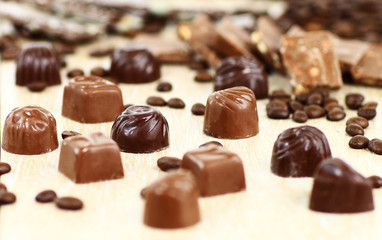 sweet chocolate candies and coffee beans
