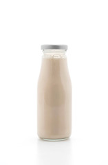 milk in bottle on white
