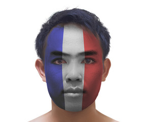 face painting of serious asian young France football fan on whit