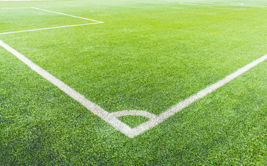 The football field corner with artificial grass