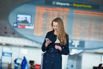 Young female traveler in international airport