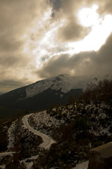 Snowy wooded and mountainous winter landscape