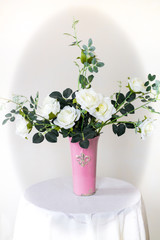 white roses in a vase