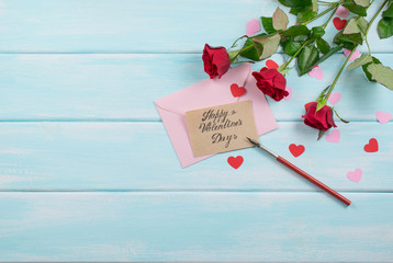 Roses with hearts and greeting or invitational card for Valentin