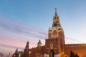 Fototapeta premium Iconic view of Spasskaya tower of Kremlin from the Red Square at sunset 