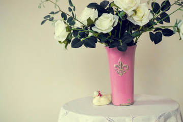 white roses in a vase