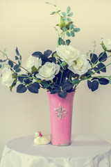 white roses in a vase