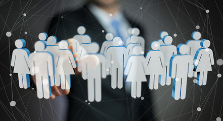 Businessman touching 3D rendering group of people with his finge