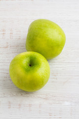 green apples on a white background