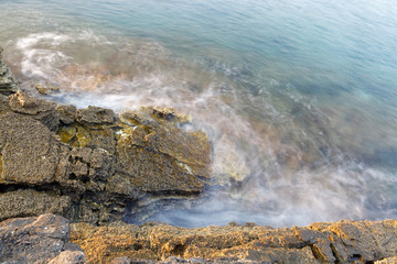 Aegean shore in Greece, Thassos island - waves and rocks - long exposure photography
