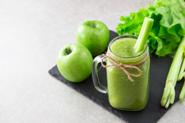 Blended green smoothie with ingredients. Superfood, detox 