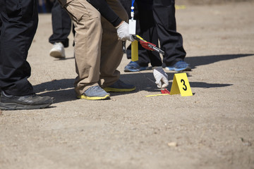 forensic team searh and evidence marker in crime scene training