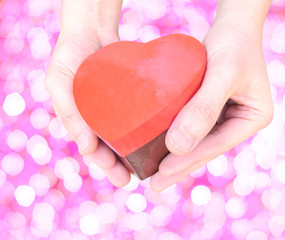 Obraz premium heart gift hand pink illumination