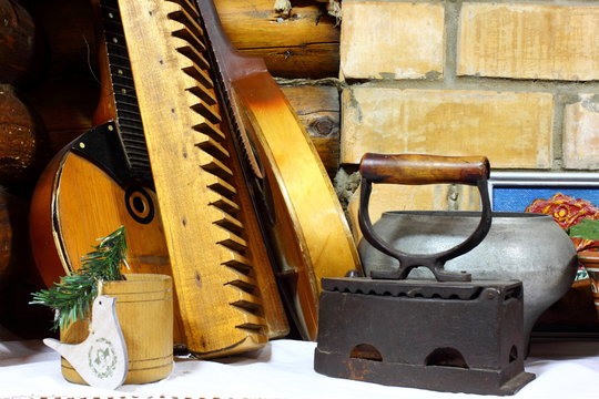 Vintage washing board, iron, bandura. Ancient traditional Ukrainian lifestyle