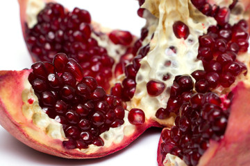 cut pomegranate with seeds