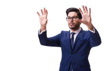 Young businessman pressing virtual buttons isolated on white
