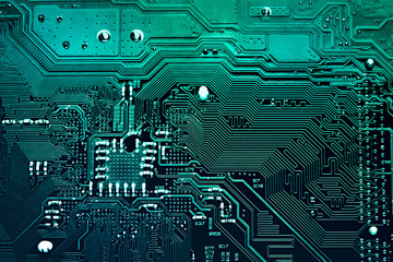 dark blue and green circuit board, top view