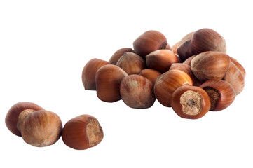 hazelnuts over a white background