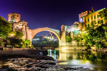July 11, 2016: Stari Most bridge lit up by night in the town of Mostar