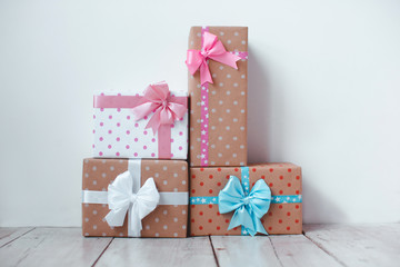 Stylish gift boxes on white.