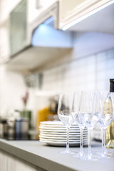 Clean tableware in modern kitchen interior