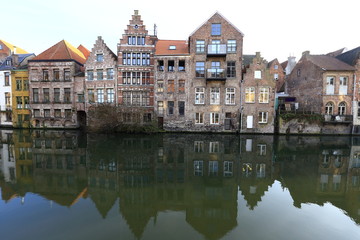 Fototapeta na wymiar Old buildings along a canal in Ghent, Belgium