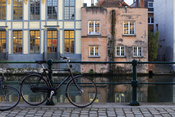 Fototapeta na wymiar Bicycle parked at the side walk in the city of Ghent, Belgium
