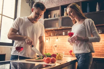 Wall murals Cooking Beautiful couple cooking