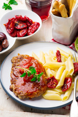 Pork Cutlets in Pizzaiola Sauce.