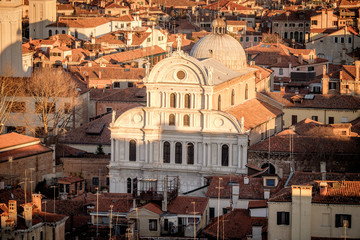 Panoramic aerial cityscape of Venice,with rooftops, the sea at sunset, Veneto, Italy.