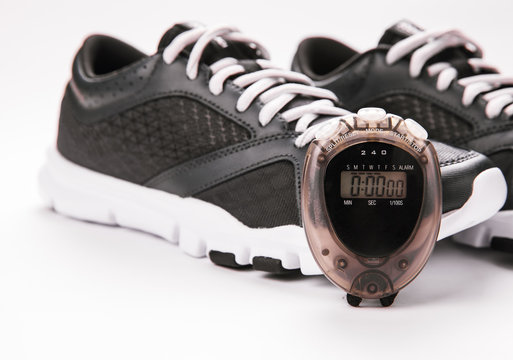 Running Shoes and stopwatch. sport