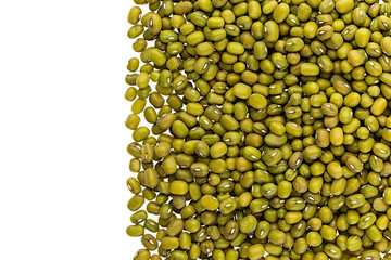 Border of mung green beans closeup with copy space on white background. Isolated. Healthy protein food.